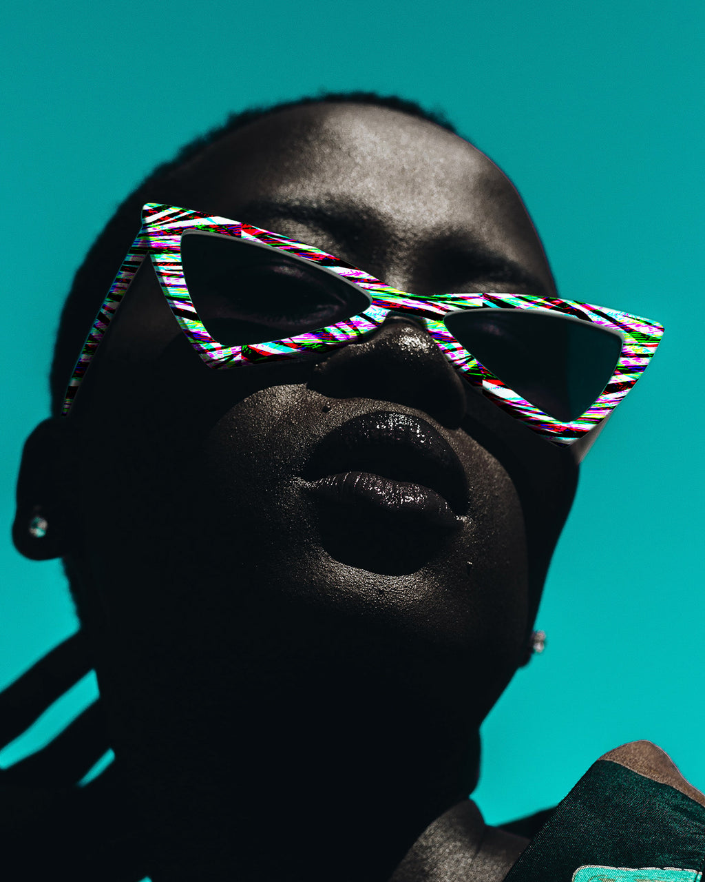 Person wearing colorful sunglasses against a teal background.

Vibrant Multicoloured Zebra Striped seamless pattern. High-resolution abstract animal print with bright colours for textile and apparel design.