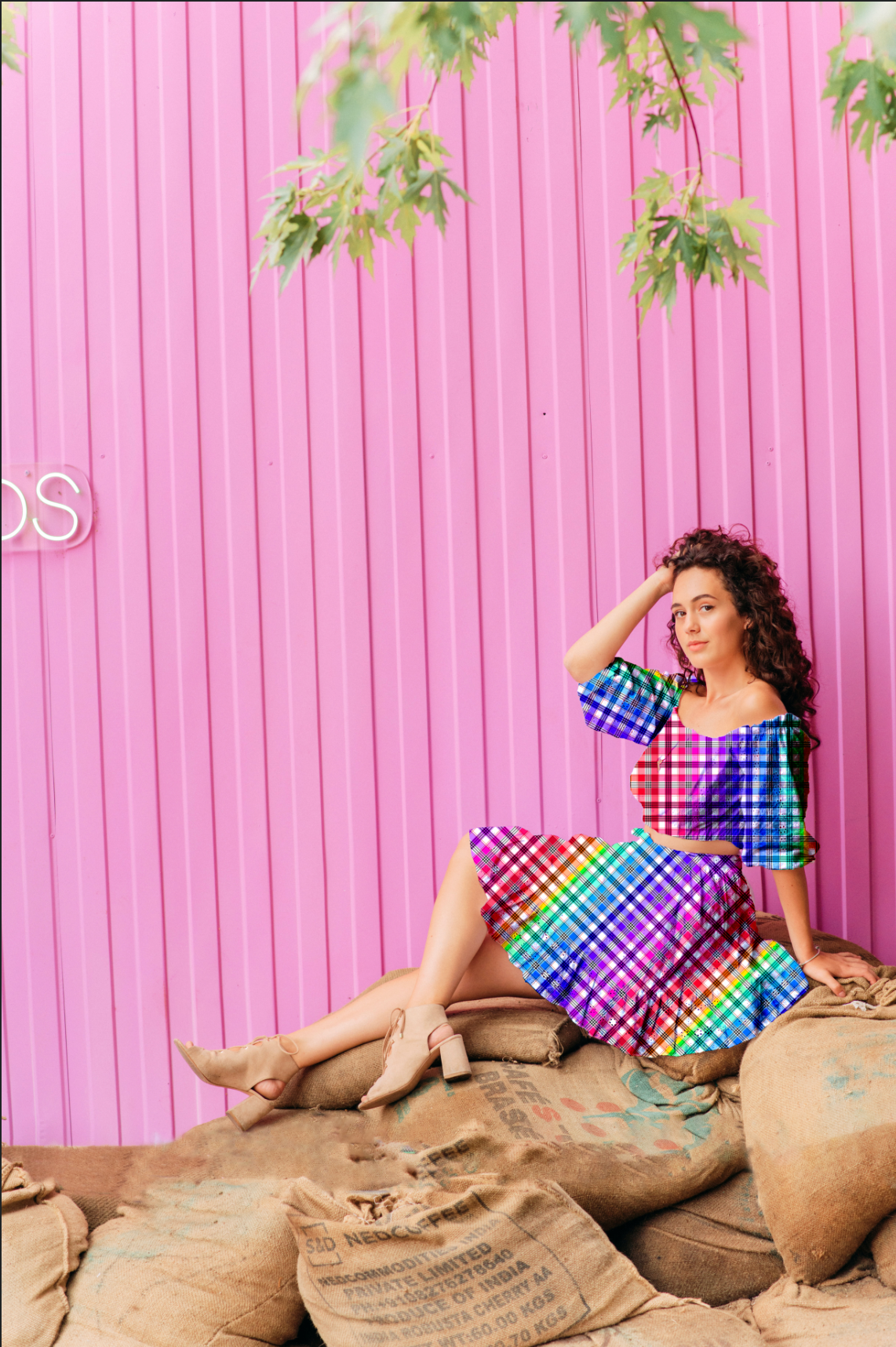 Woman in a colorful dress sitting on burlap bags against a pink wall with 'Dior' branding.

Vibrant Multicolour Plaid seamless pattern. High-resolution modern tartan check print for textile and apparel design.