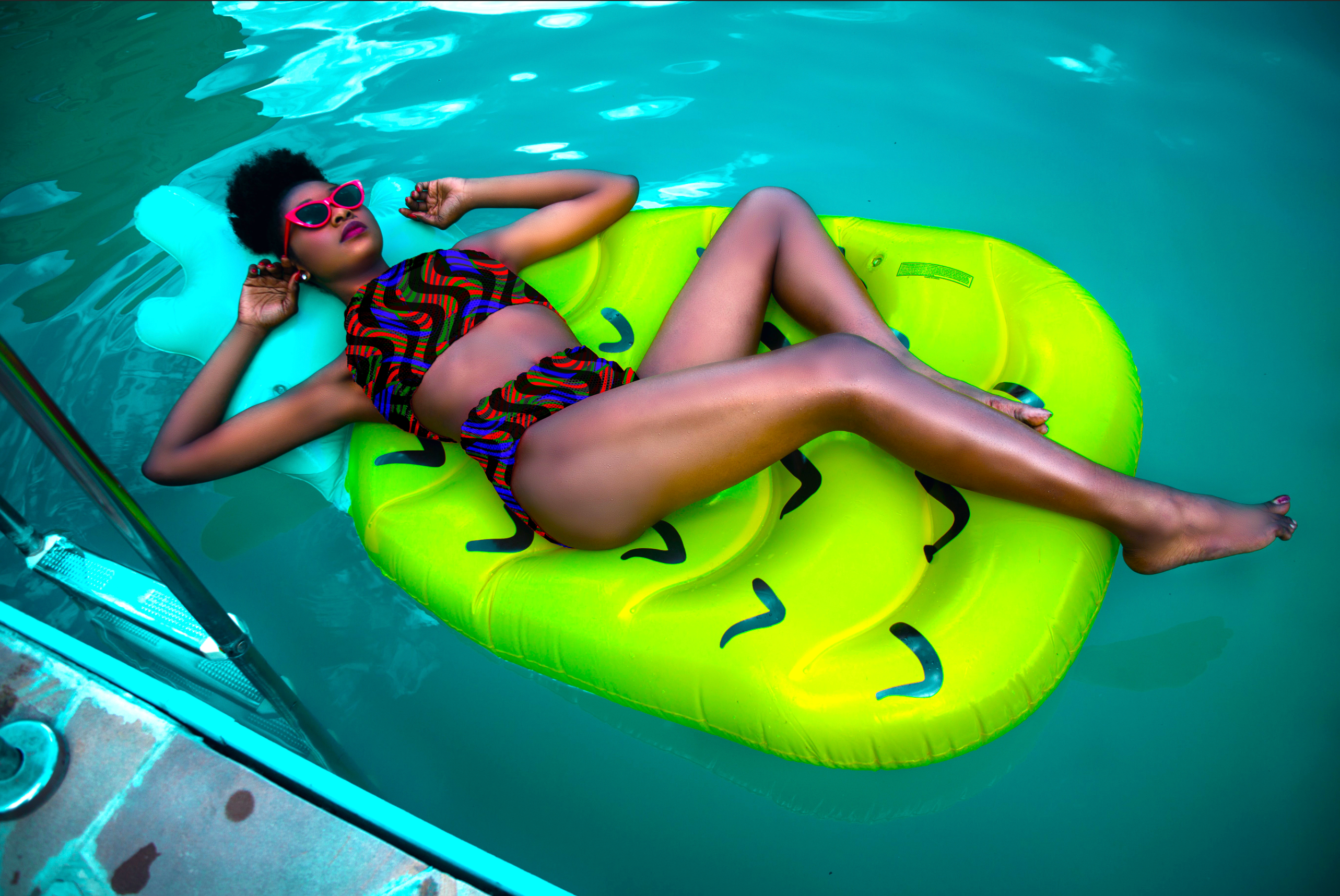 Woman lounging on a green inflatable ring in a pool

Vibrant Blue and Red Wavy Stripe Chevron seamless pattern. High-resolution dynamic geometric print for textile and apparel design.