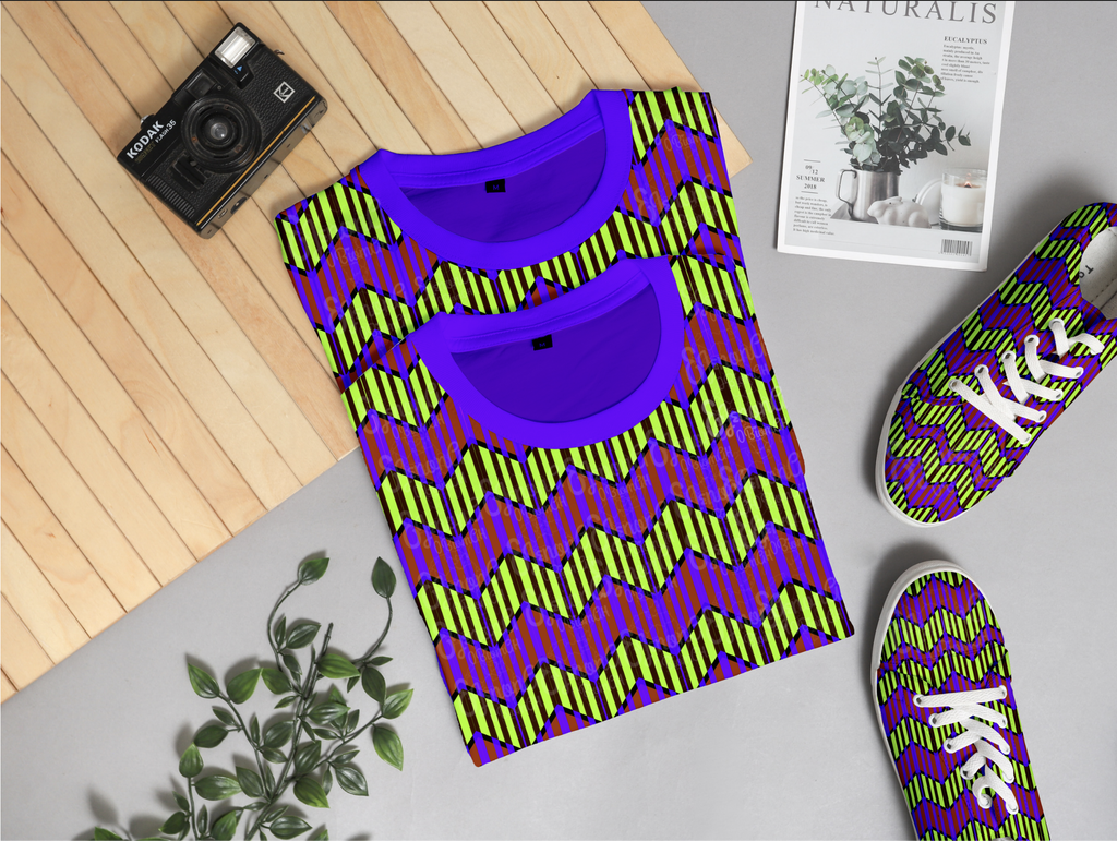 Purple and green patterned shirt, shorts, and shoes on a gray surface with a camera and plant.

Vibrant Green and Fuchsia Pink Chevron seamless pattern. High-resolution bold geometric print for apparel and fabric design.