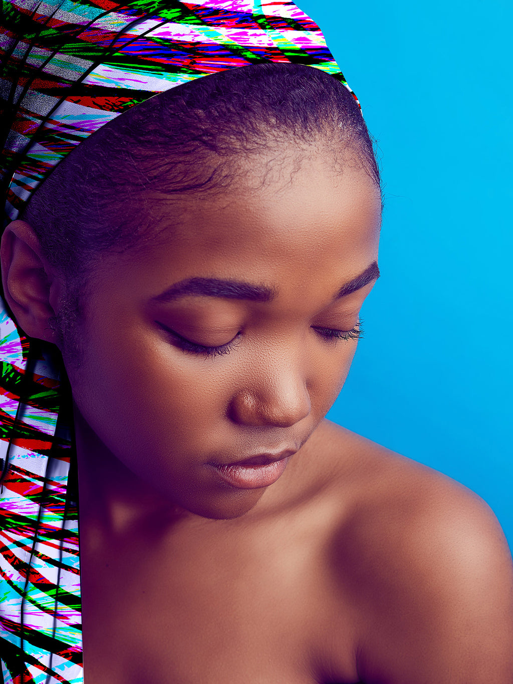 Woman with colorful headscarf against a blue background.

Vibrant Multicoloured Zebra Striped seamless pattern. High-resolution abstract animal print with bright colours for textile and apparel design.