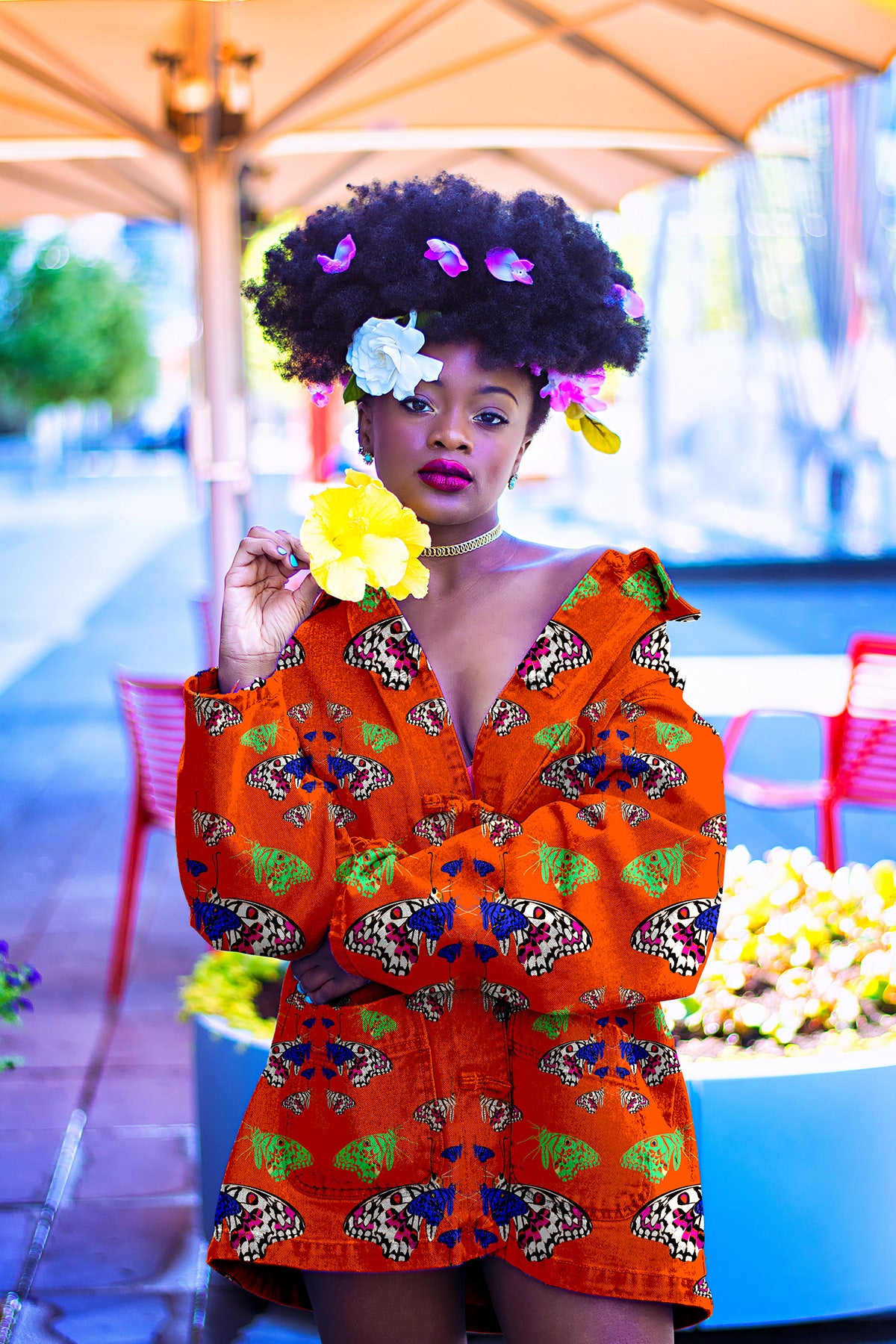 Woman in a colorful dress with butterfly patterns outdoors

Vibrant Orange seamless pattern with various multicolour butterfly and insect prints. High-resolution digital file for apparel and fabric design.